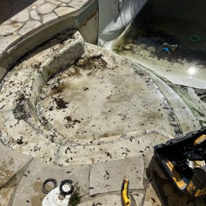 a pool with a dirty surface